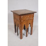 A Moorish occasional table inlaid with boxwood mother of pearl and ebony, 24" high, 17½" square