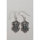 A pair of 925 silver Art Nouveau style drop earrings with floral decoration, 1" drop