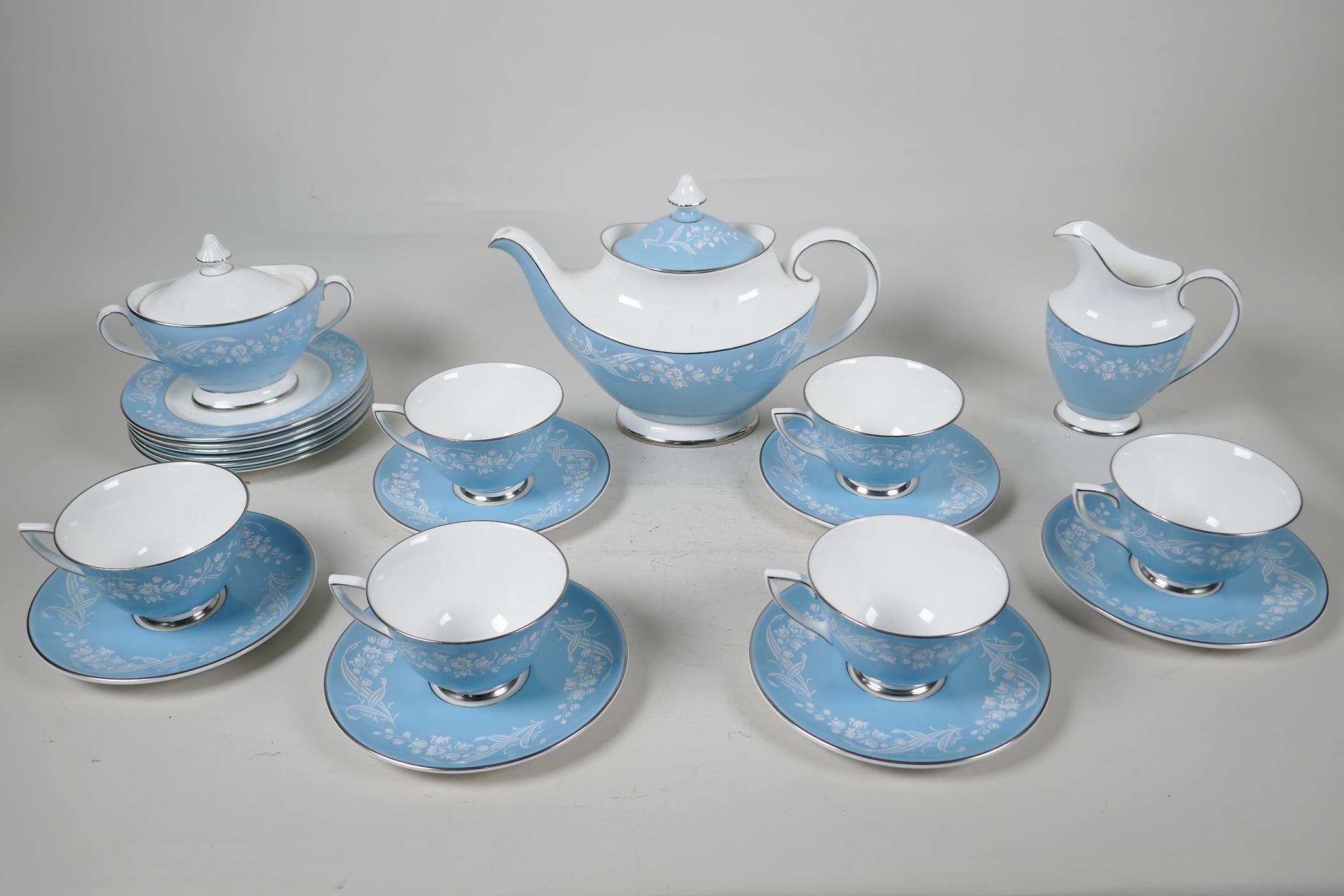 A Royal Doulton 'Alexandria' pattern six part tea service with teapot, milk jug and sugar bowl,