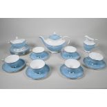 A Royal Doulton 'Alexandria' pattern six part tea service with teapot, milk jug and sugar bowl,