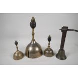 Three early tuned hand bells, 11" high, and a C19th French brass shop bell