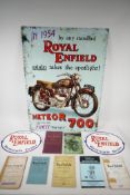 A replica Royal Enfield metal advertising sign, two painted cast iron wall plaques and a