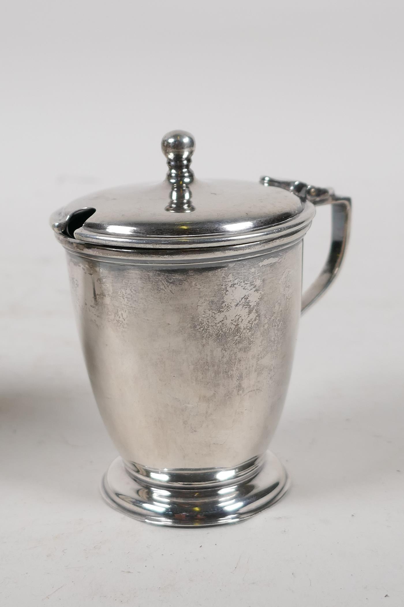 A hallmarked silver sauce boat, Birmingham 1924, and a silver mustard pot with blue glass liner, - Image 4 of 6