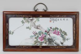 A republic period polychrome panel depicting birds and flowers, in an inlaid hardwood frame,