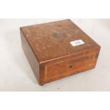An early C20th French inlaid yew wood musical box, playing two airs, A/F lacks one foot, 7½" x 7½" x
