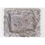 A Chinese silver plated tray embossed with dragons chasing the flaming pearl, 8" x 6"