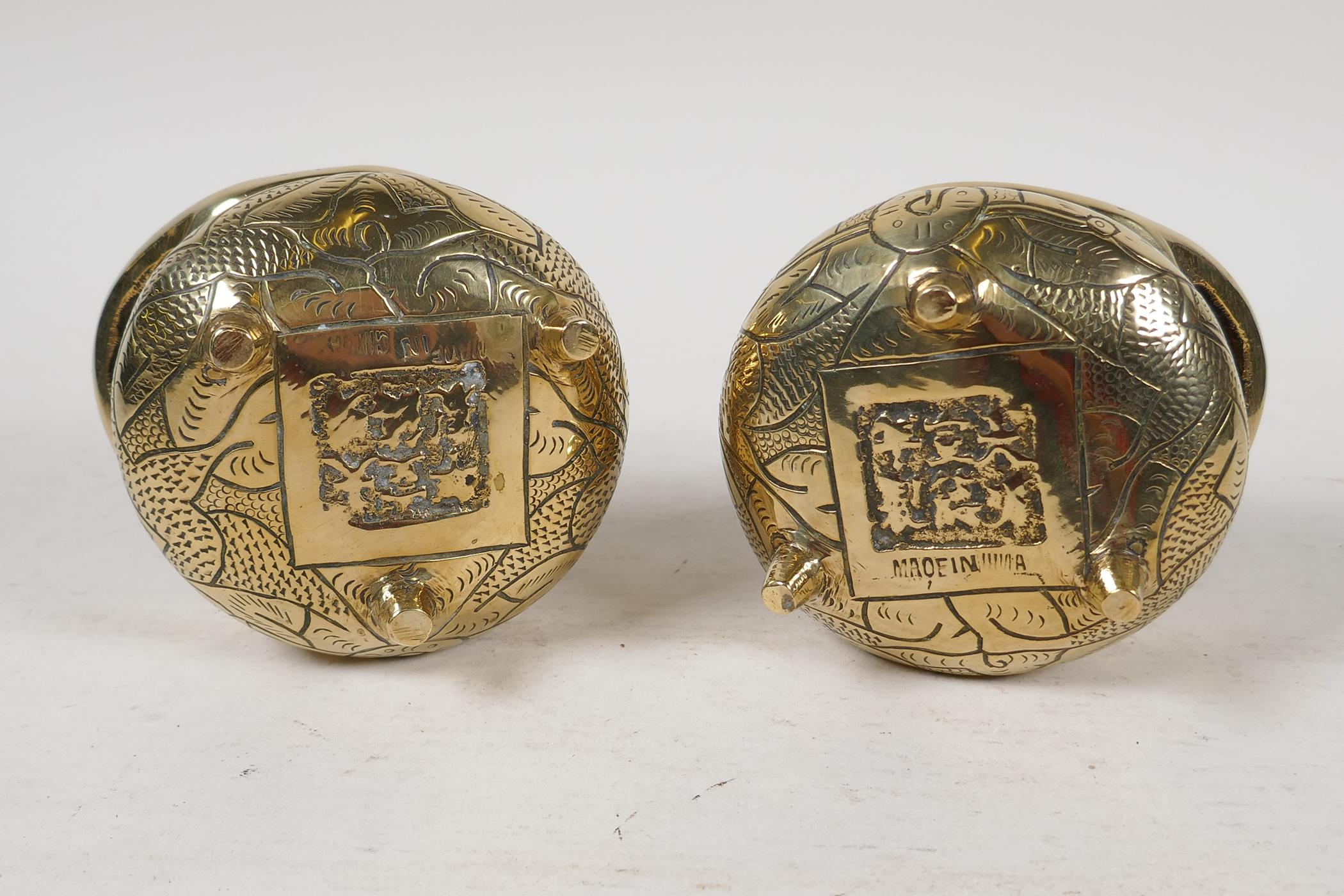 A pair of Chinese polished bronze incensors with loop handles and engraved bodies, 4" diameter - Image 3 of 3
