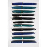 An assortment of Parker fountain pens, including two 'Maxima Duofold', three 'Duofold', two 'lady'