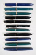 An assortment of Parker fountain pens, including two 'Maxima Duofold', three 'Duofold', two 'lady'