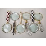 Six hand held desk top magnifying glasses, different handles, glass 4" diameter