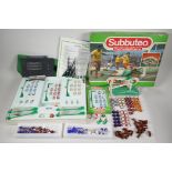 A quantity of vintage Subbuteo including numerous alternate teams and other additional components