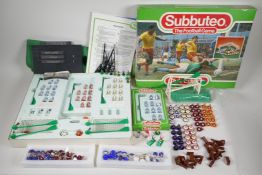 A quantity of vintage Subbuteo including numerous alternate teams and other additional components