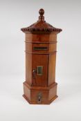 A fruitwood table post box in the form of a Chinese pagoda, with single drawer to base, 21" high