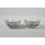 A pair of late C19th/early C20th famille rose porcelain rice bowls decorated with children at