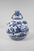 A blue and white porcelain two handled moon flask decorated with musicians in a landscape, Chinese