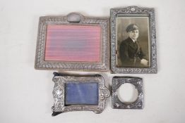 Four vintage silver photo frames, unmarked, largest aperture 5½" x 4½"