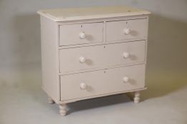 A Victorian painted pine chest of two over two drawers, raised on turned supports, 32" x 34" x 16"