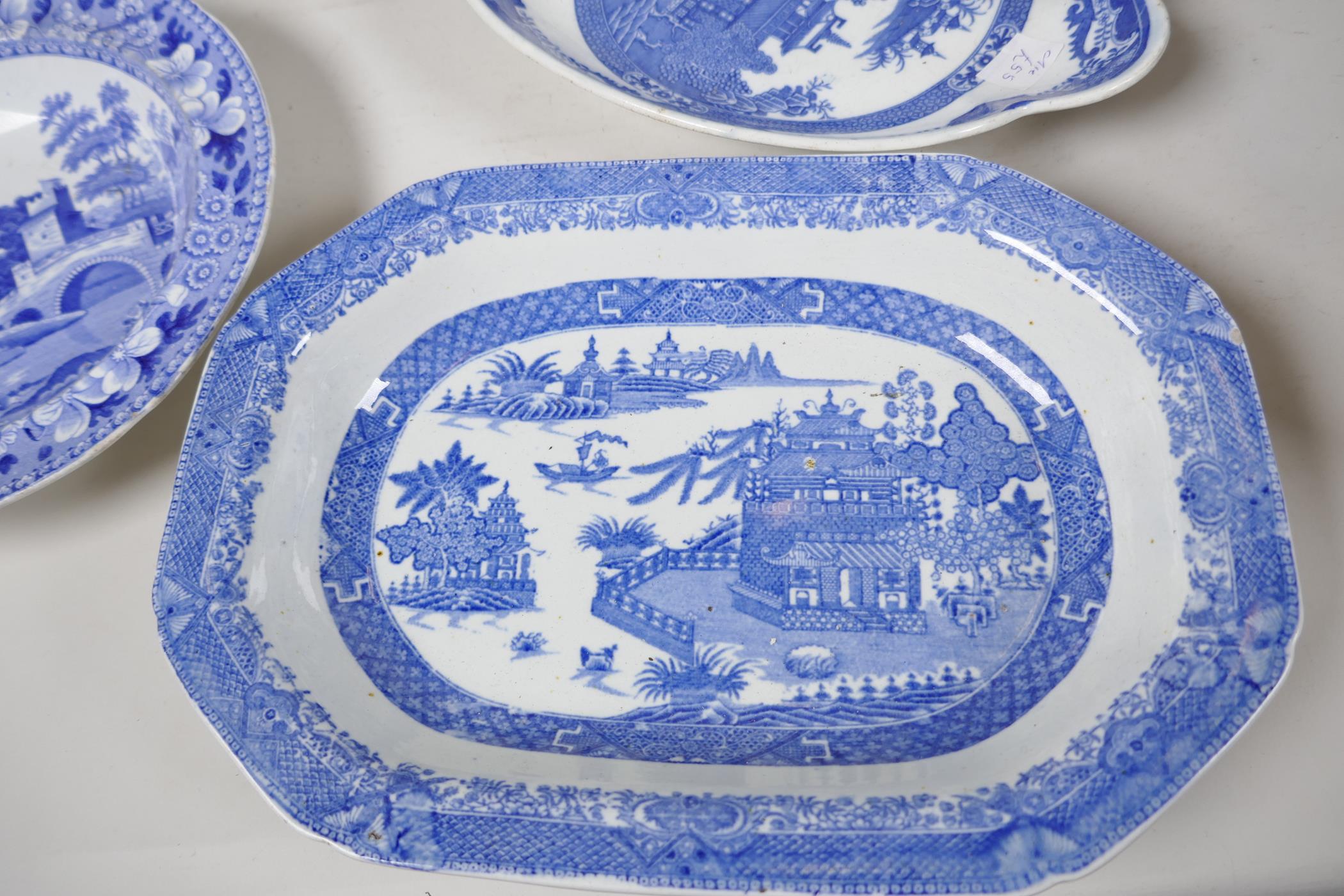 A quantity of C19th blue and white pottery to include a crescent shaped tureen, 13" wide, a petal - Image 4 of 4