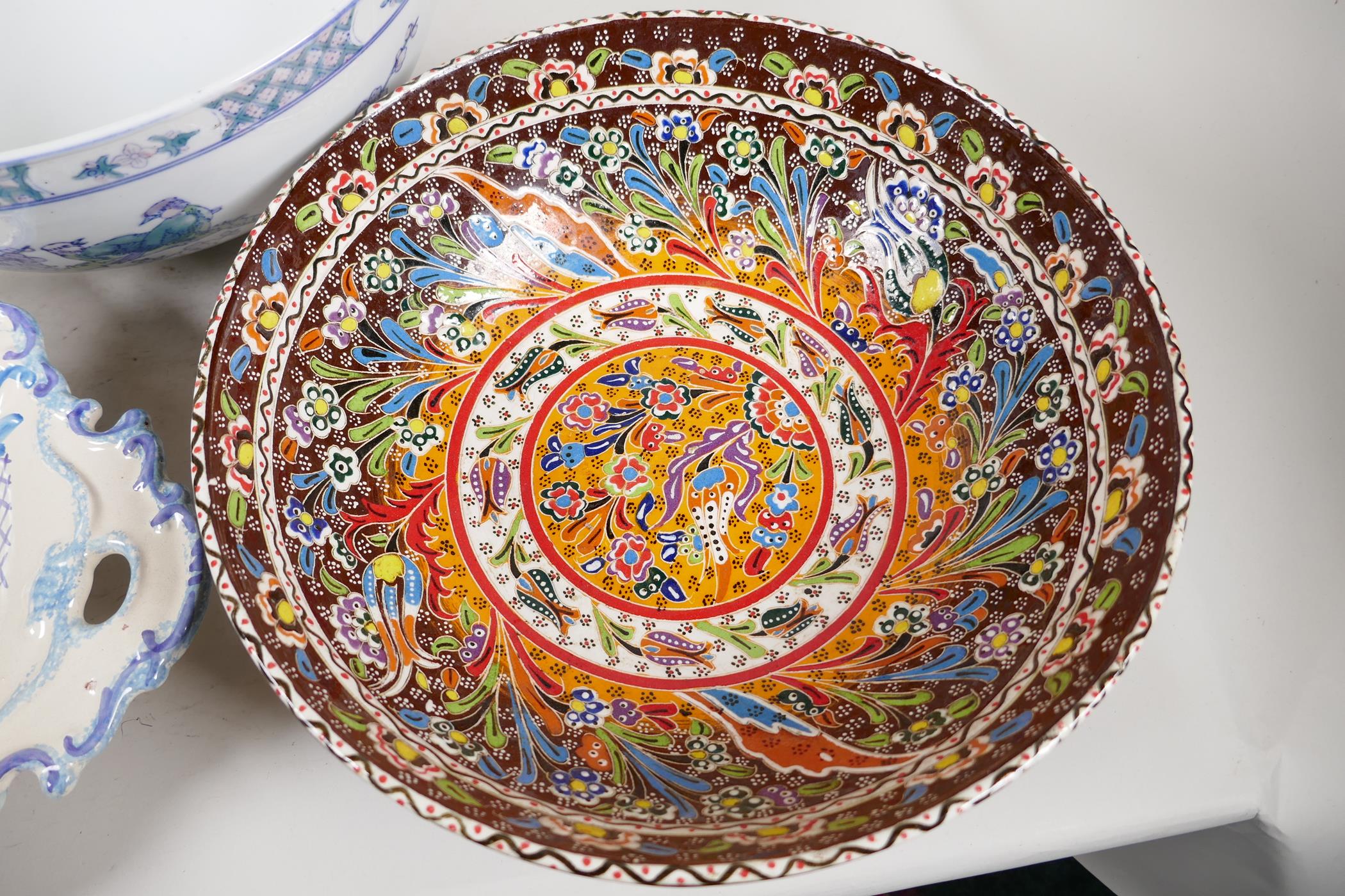 A Chinese porcelain bowl decorated with flowers, 12" diameter, a brightly coloured bowl in the style - Image 3 of 4
