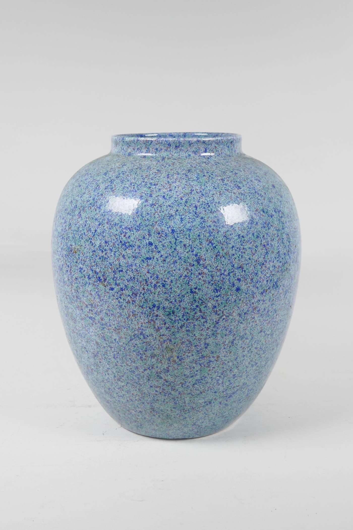 A Continental porcelain vase with a blue speckled glaze, 11" high