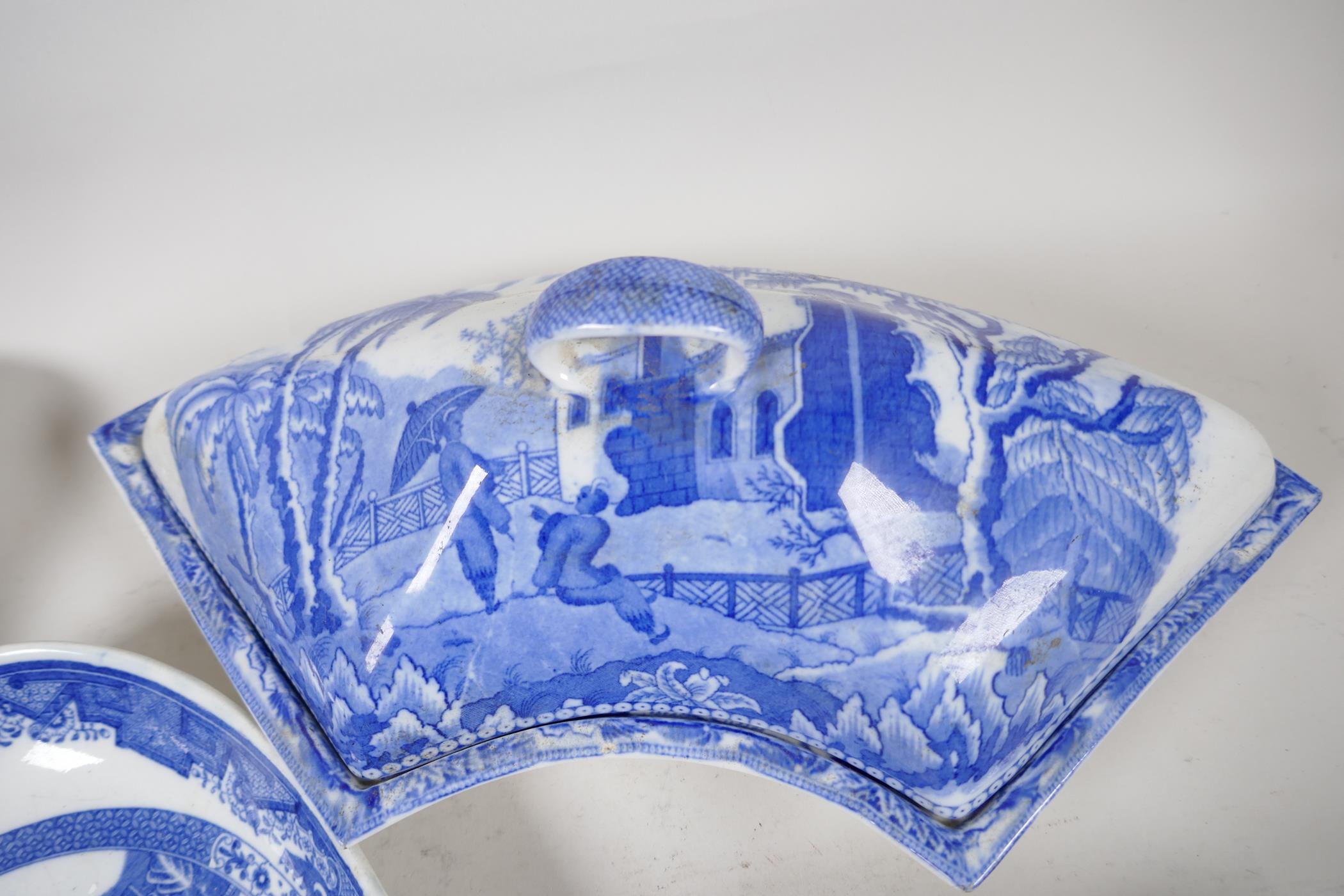 A quantity of C19th blue and white pottery to include a crescent shaped tureen, 13" wide, a petal - Image 2 of 4