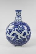 A Ming style blue and white porcelain moon flask with dragon decoration, incised Chinese four