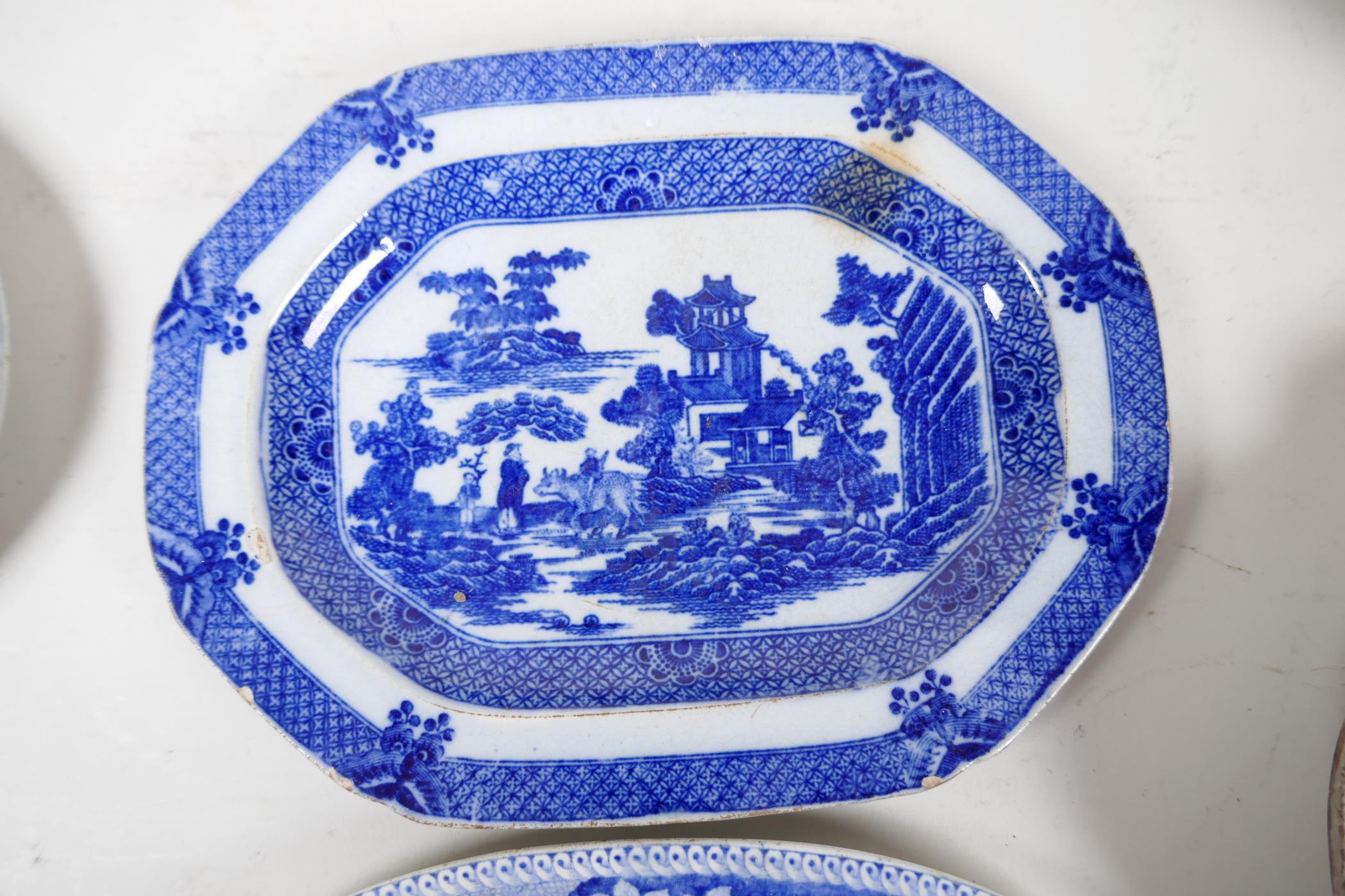 Eight C19th blue and white pottery dishes, various patterns to include the Long Bridge, Boy on a - Image 4 of 7