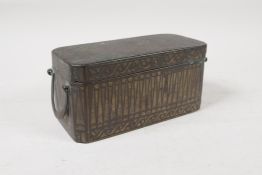 A C19th south east Asian silver inlaid bronze betle nut box with three interior compartments,