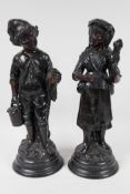 A pair of French C19th brown glazed earthenware figures, marked HB (Quimper) G75, 13" high