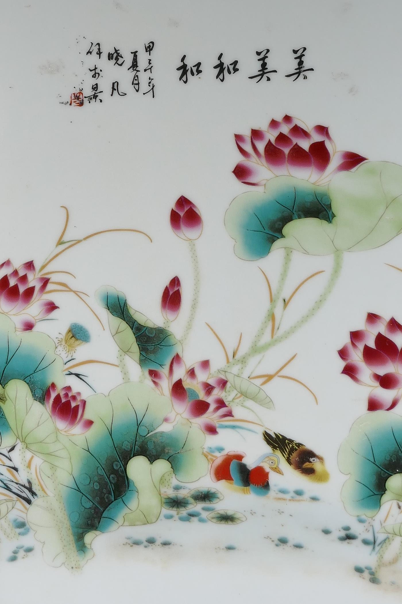 A Chinese polychrome porcelain table screen in a hardwood frame, decorated with waterfowl beneath - Image 2 of 3