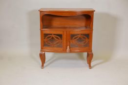 An early C20th Danish inlaid solid satinwood two door glazed side cabinet on carved cabriole