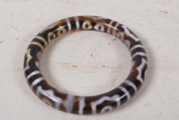 A banded agate bangle, 3" diameter