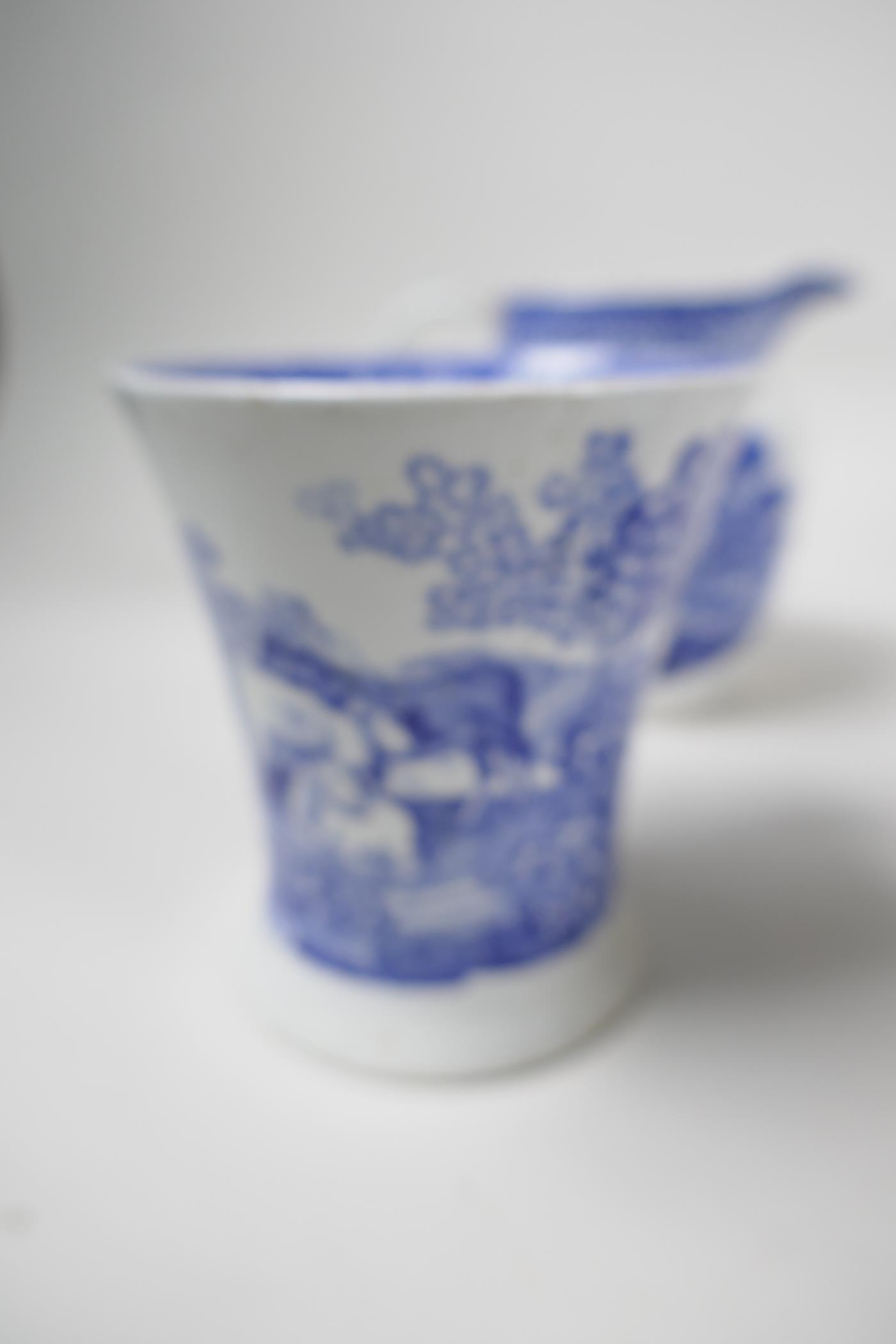 A collection of early C19th blue and white pottery mugs, jugs and small teapot - Image 7 of 8