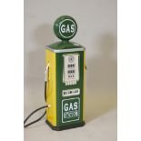 A child's 'gas' pump in racing green and yellow, 31½" high