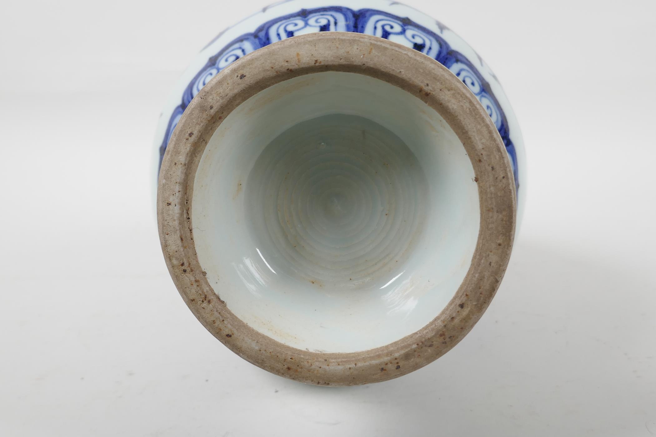 A blue and white porcelain vase with floral decoration, Chinese six character mark to side, 13½" - Image 6 of 6