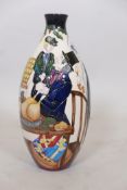A Moorcroft trial vase with designs from Dickens' Christmas Carol of Scrooge and Tiny Tim verso,