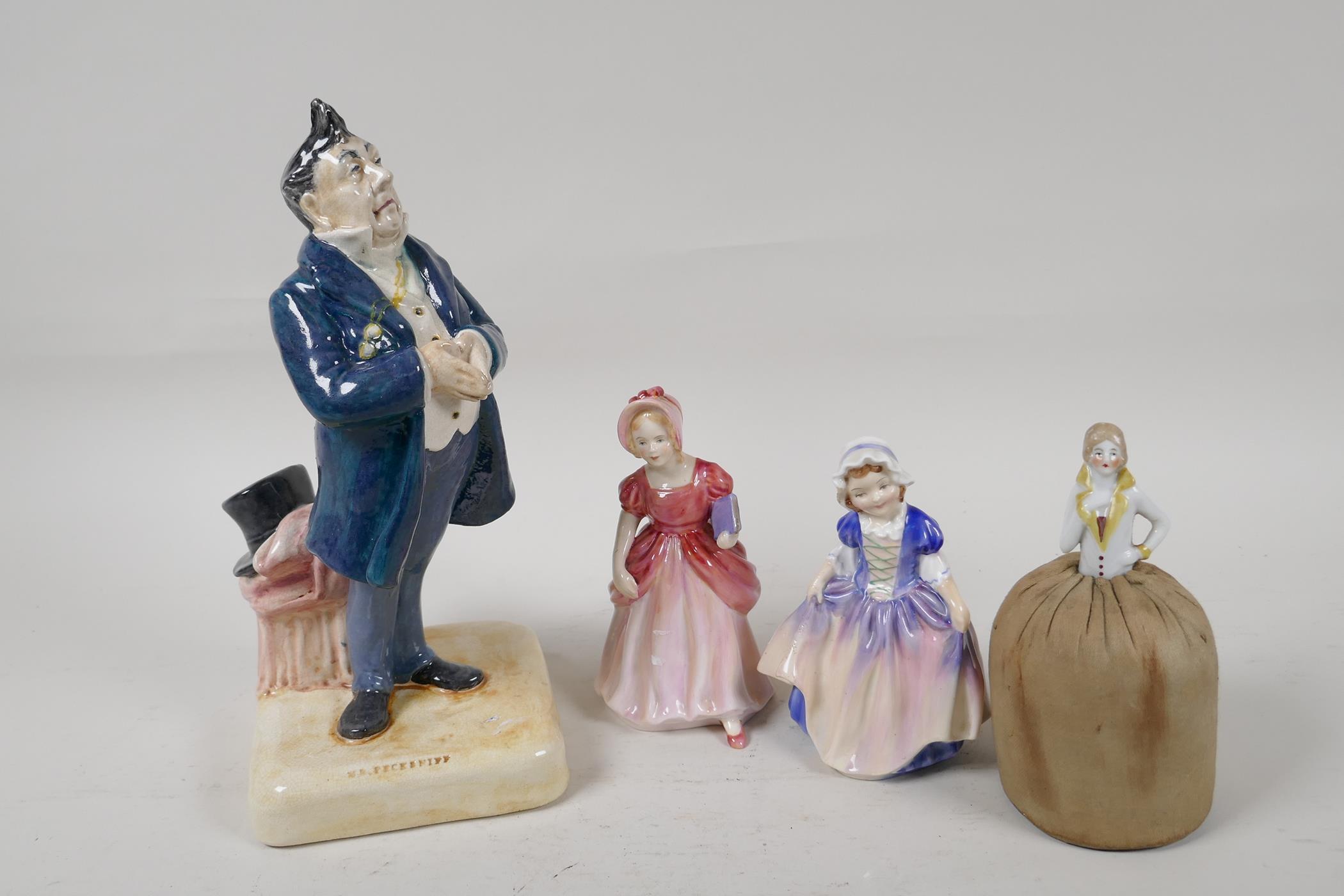 A Bretby Pottery Dickens character, 'Mr Pecksniff', 9" high, together with a Paragon pottery figure,