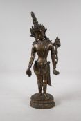 An Indian bronze deity on a lotus throne, 17" high