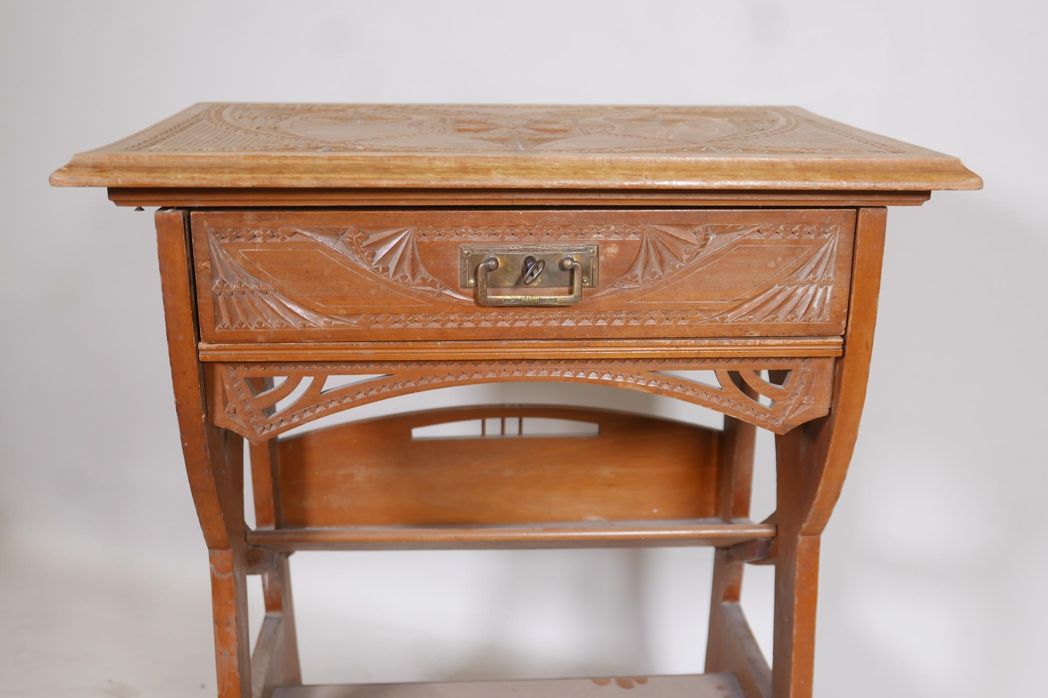 A satin walnut canterbury with carved Moorish Liberty style decoration and single drawer, A/F, - Image 3 of 4