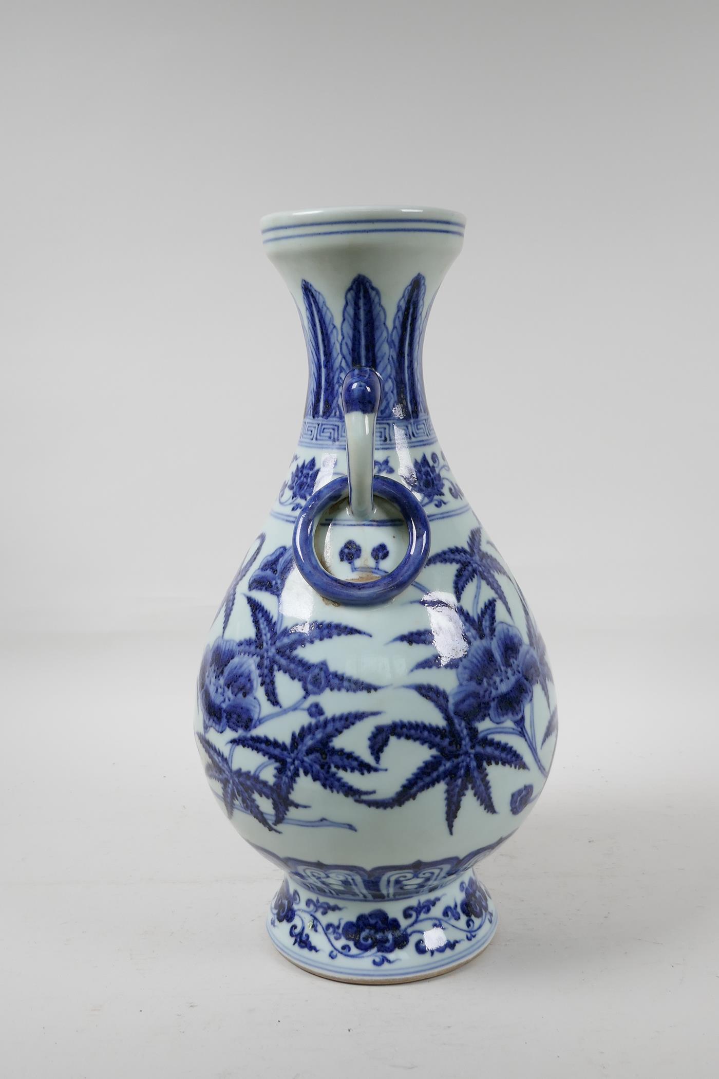 A blue and white porcelain vase with floral decoration, Chinese six character mark to side, 13½" - Image 2 of 6