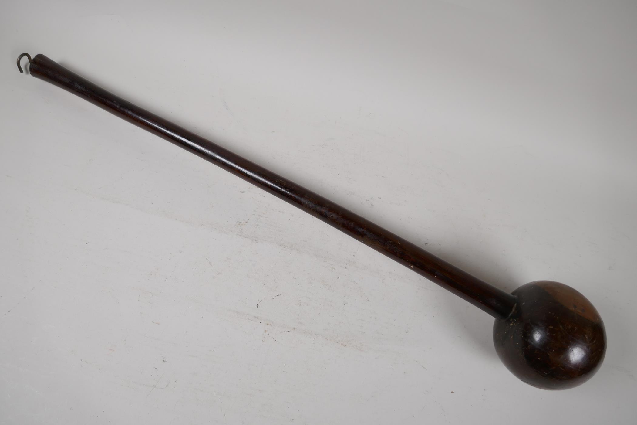An antique African hardwood knobkerrie, 23" long