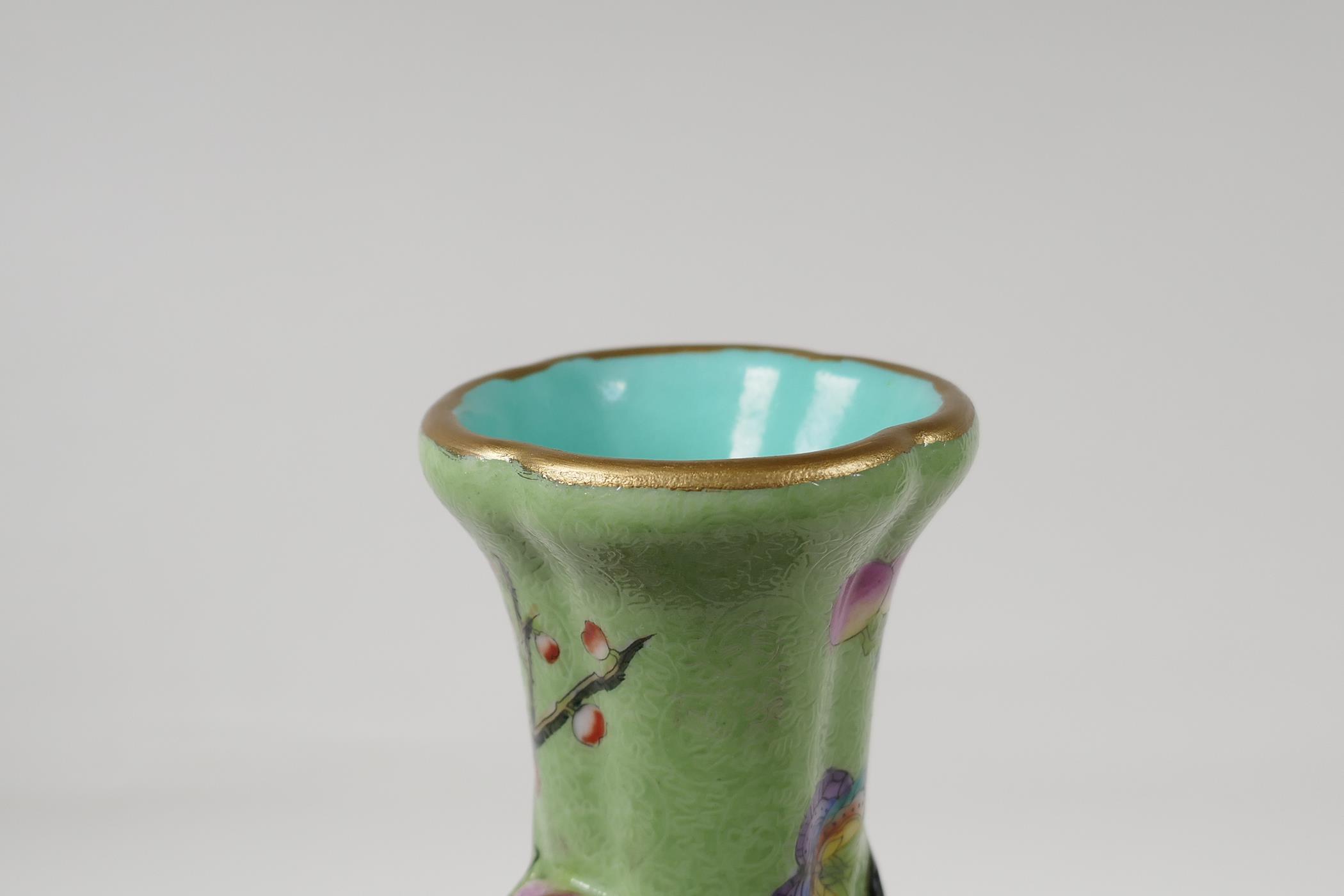 A Chinese polychrome porcelain vase with applied peach tree decoration on a green ground, seal - Image 6 of 6