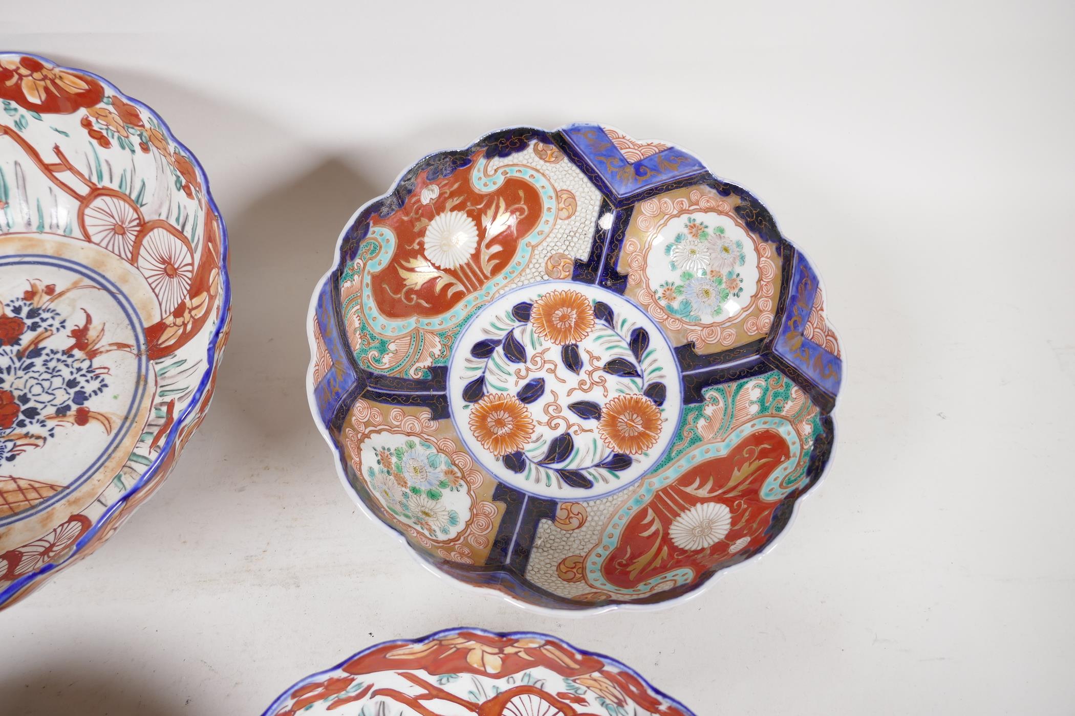 Four C19th Imari porcelain bowls decorated with traditional patterns, largest 10" diameter - Image 3 of 5