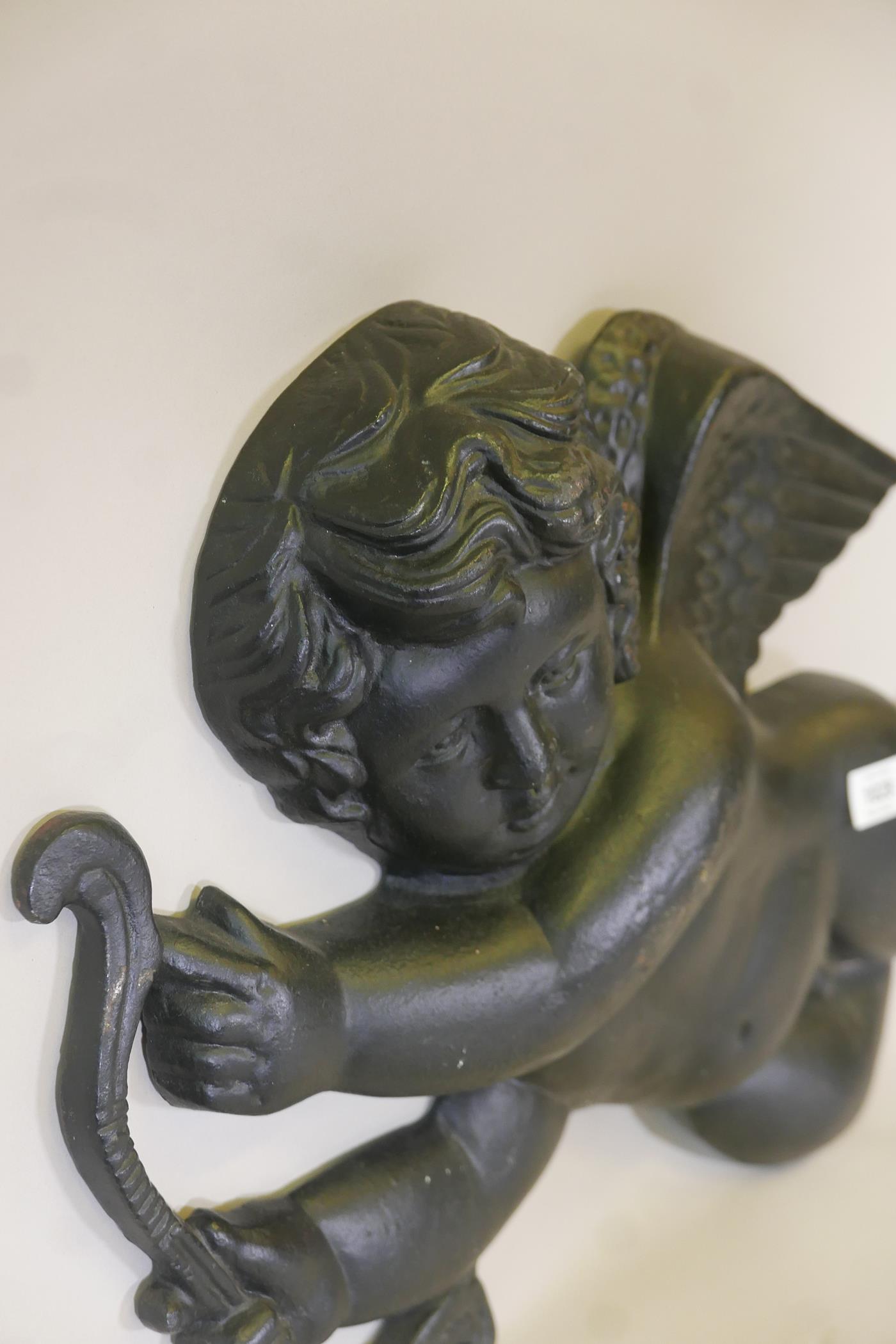 A pair of painted cast iron wall plaques in the form of cherubs, A/F, 28" long - Image 5 of 5