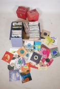 A large quantity of 45 vinyl singles, pop, classical, jazz, world etc, and four singles carry cases