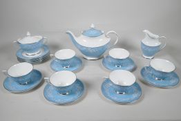 A Royal Doulton 'Alexandria' pattern six part tea service with teapot, milk jug and sugar bowl,