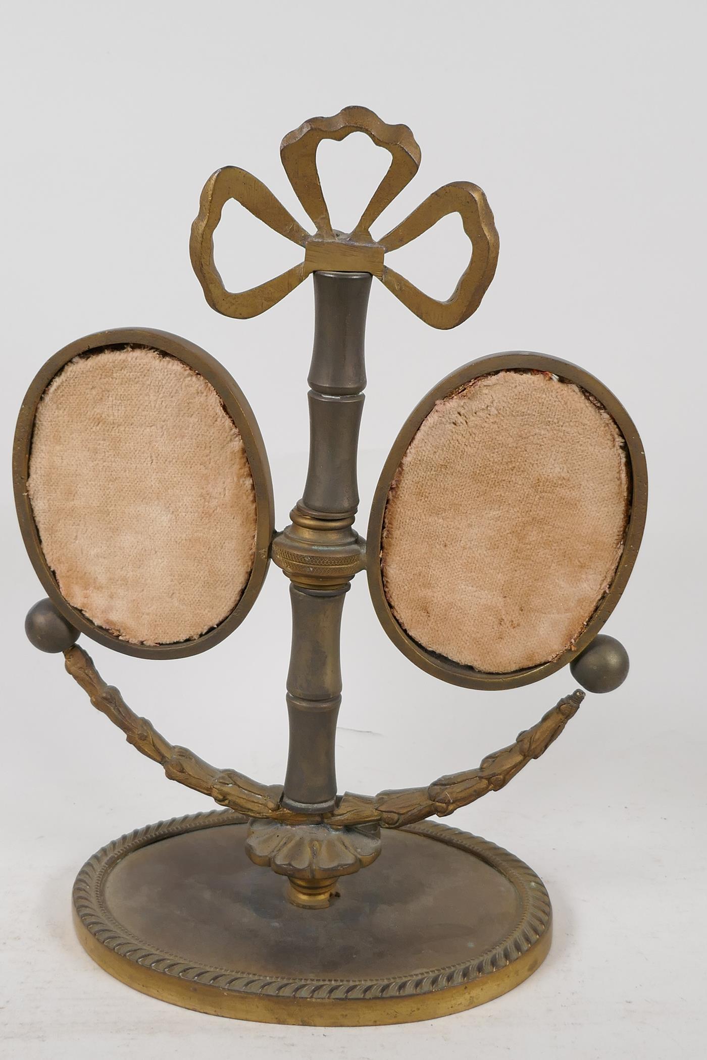 A C19th cast brass double photograph frame, 11" high - Image 4 of 4