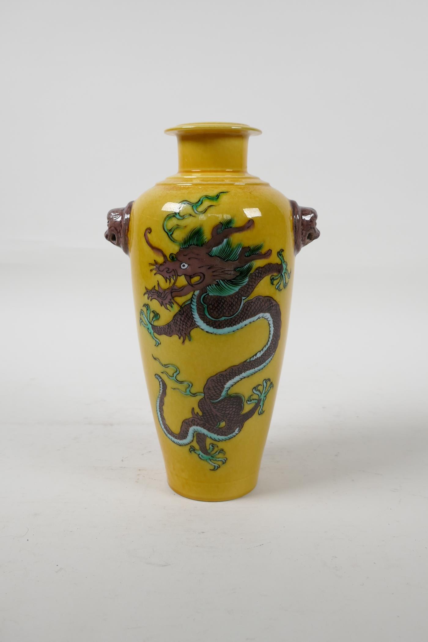 A Chinese Sancai glazed porcelain vase with two lion mask handles and dragon decoration, six - Image 3 of 5