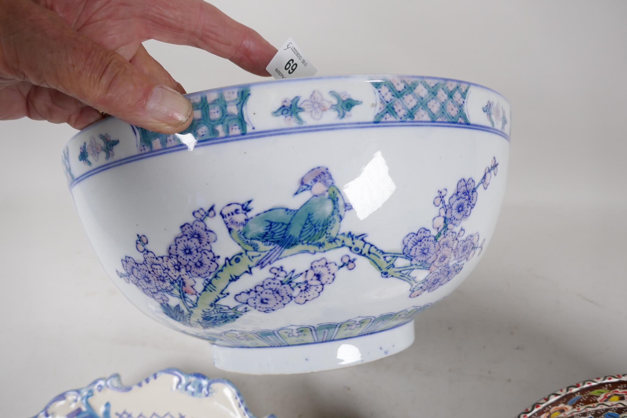 A Chinese porcelain bowl decorated with flowers, 12" diameter, a brightly coloured bowl in the style - Image 4 of 4