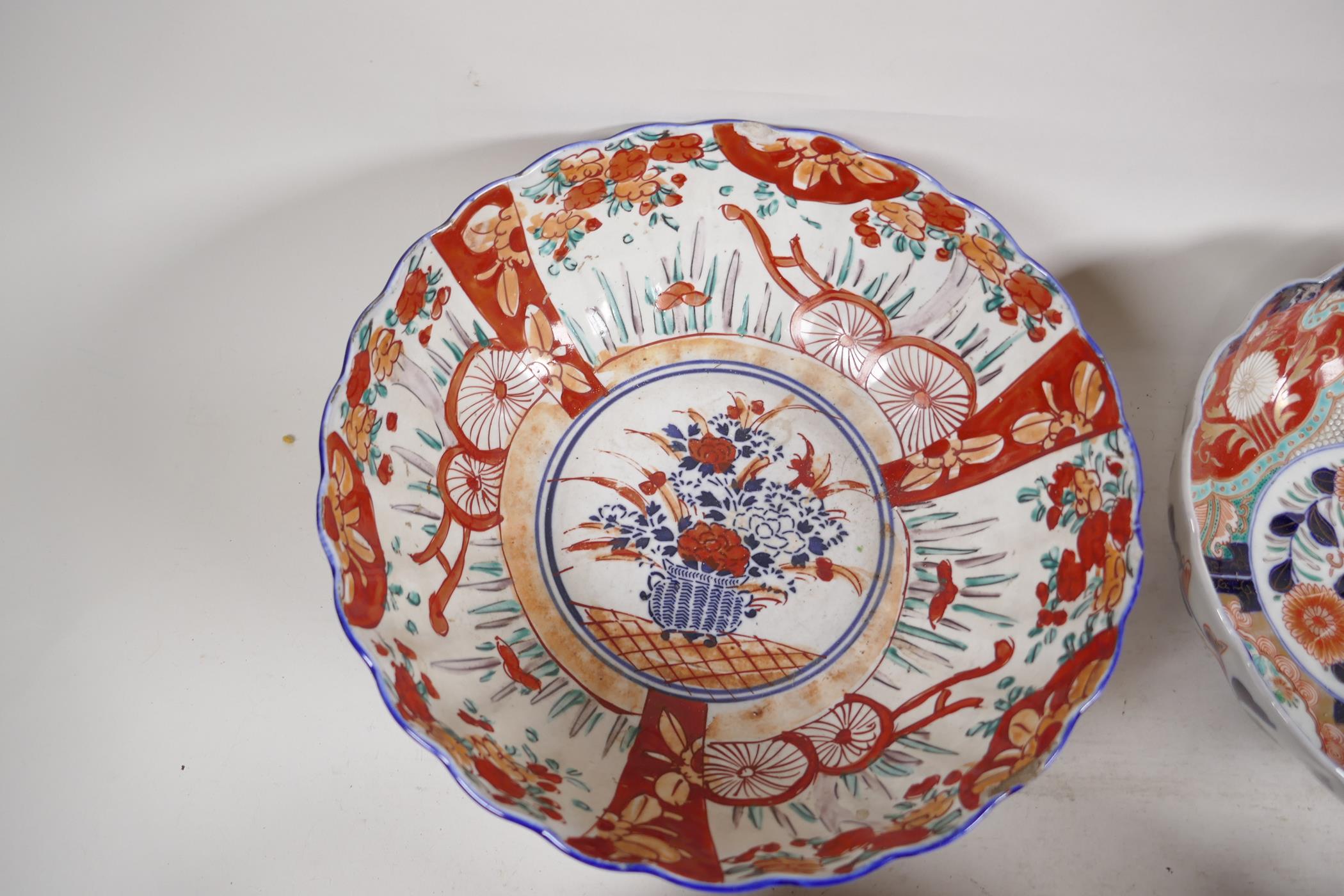 Four C19th Imari porcelain bowls decorated with traditional patterns, largest 10" diameter - Image 2 of 5